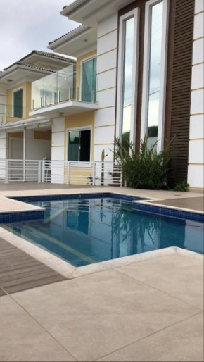 DUPLEX COM PISCINA PERÓ